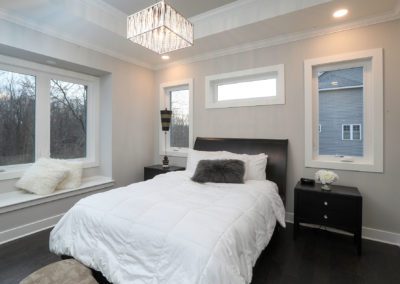 A comfortable bedroom in this in-law apartment of a Webster home.